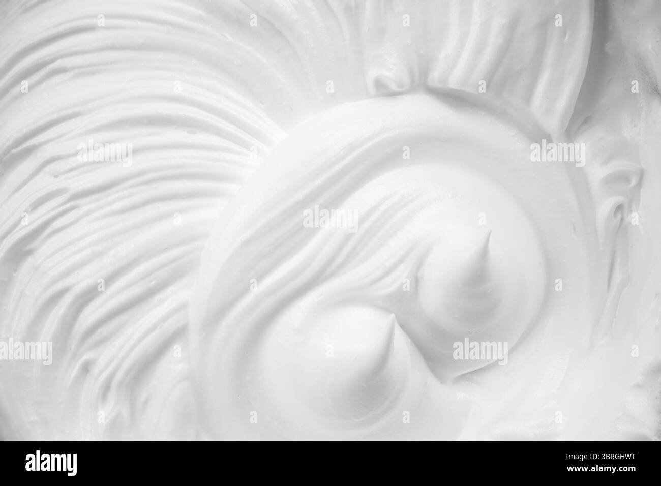 Gemischte Merengue-Creme, selektive Nahaufnahme, Vollbild Stockfoto