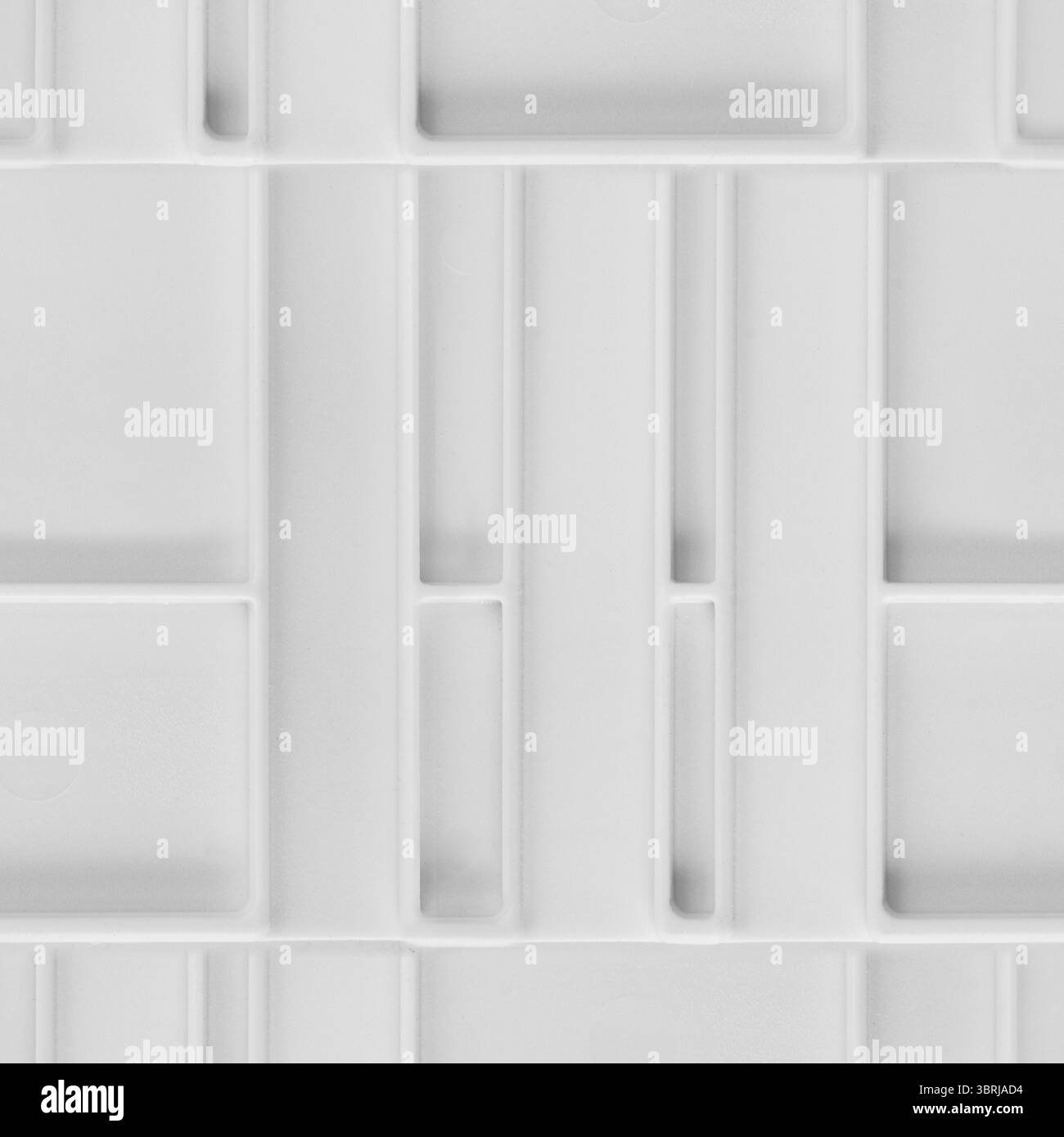 Nahtloses 4K-Fototexturmaterial aus weißem, technischem Kunststoffpanel. Stockfoto