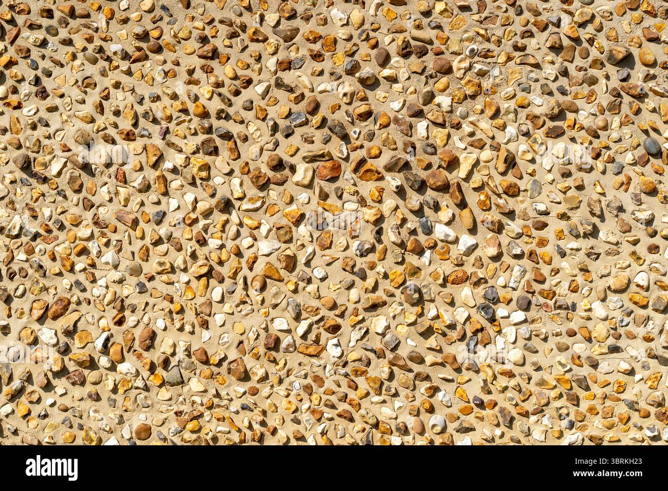 Wand mit Kieselstein und Armaturenbrett Stockfoto