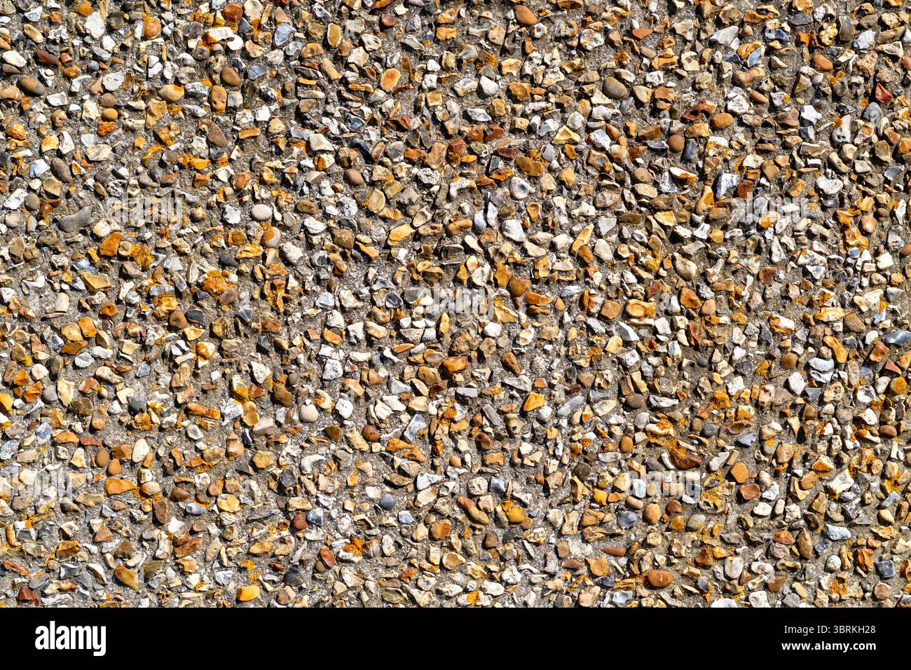 Wand mit Kieselstein und Armaturenbrett Stockfoto