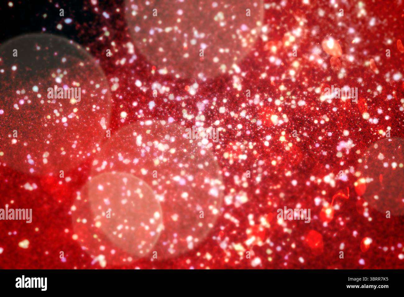 Weißer Schnee und Sterne auf Rot Stockfoto