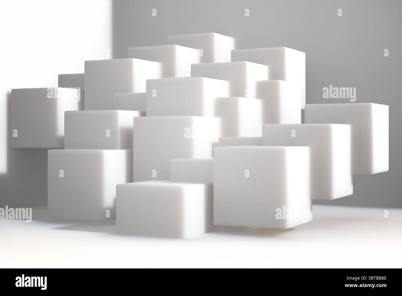 Gruppe weißer geometrischer Würfel, die auf weißem Boden vor grauem Hintergrund schweben und linkes Licht empfangen Stockfoto Gruppe weißer geometrischer Würfel, die auf weißem Boden vor grauem Hintergrund schweben und linkes Licht empfangen Stockfoto