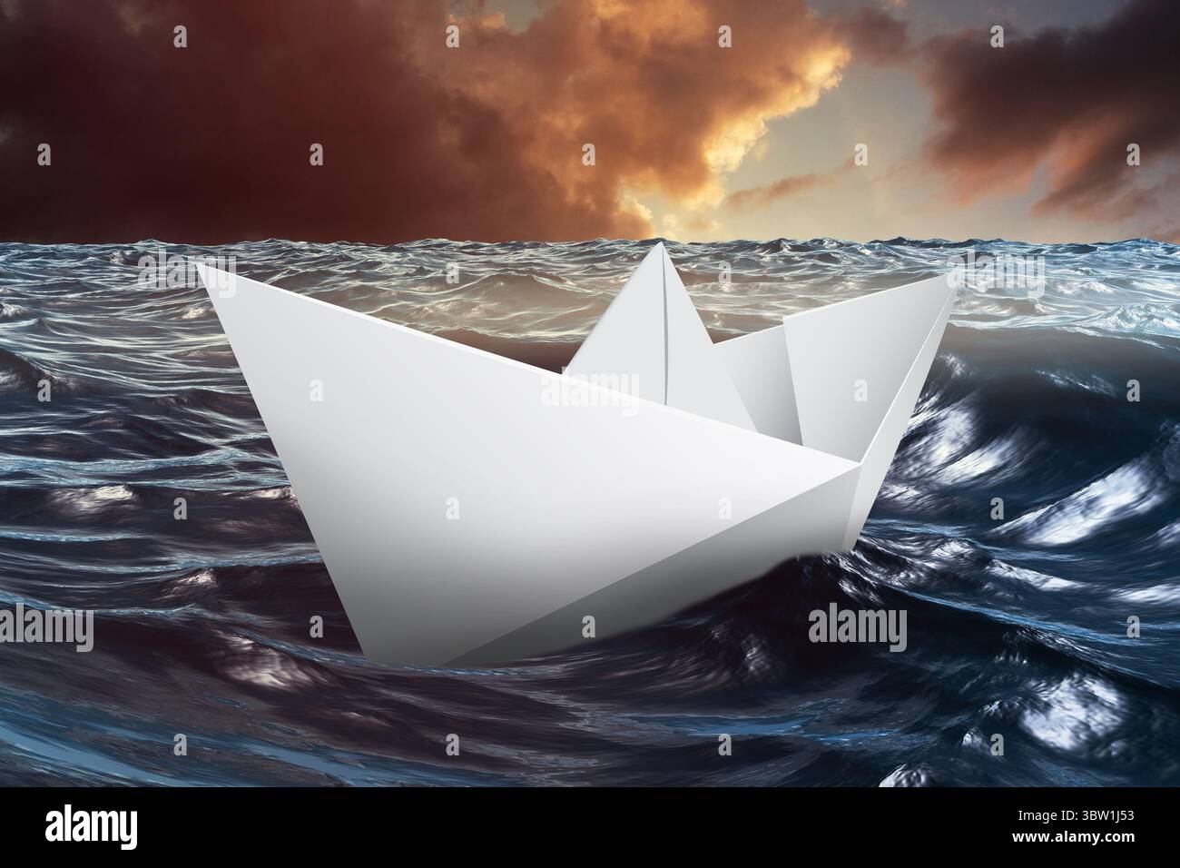 Papierboot schwimmt auf dem Meer Stockfoto