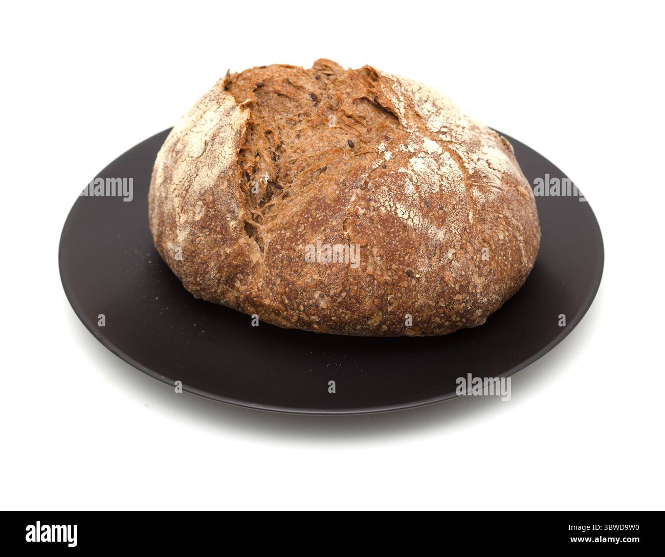 Sauerteig gesäuertes rundes Malzbrot mit verschiedenen Samen Stockfoto