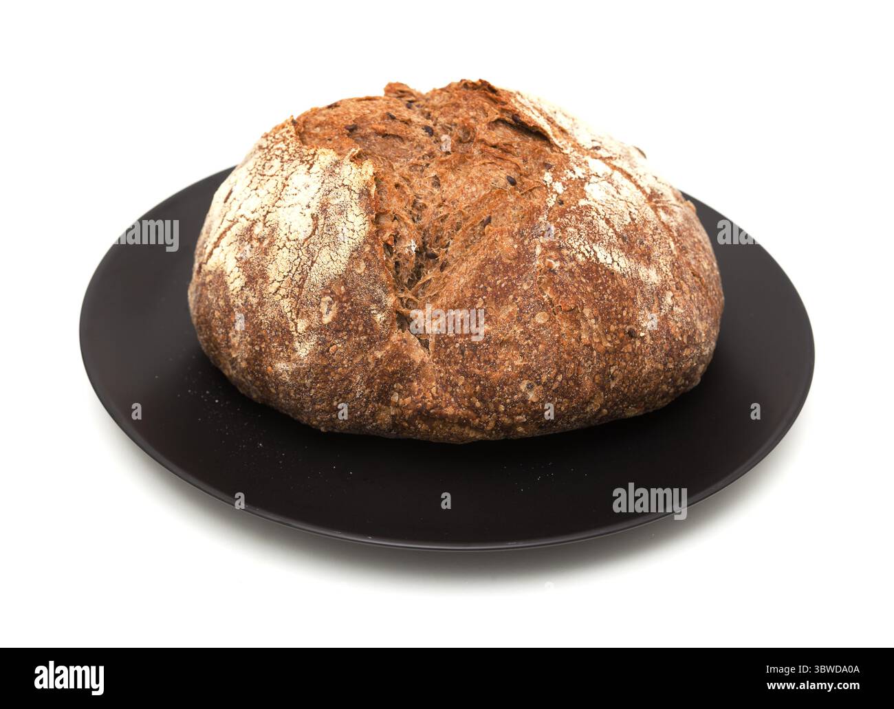 Sauerteig gesäuertes rundes Malzbrot mit verschiedenen Samen Stockfoto