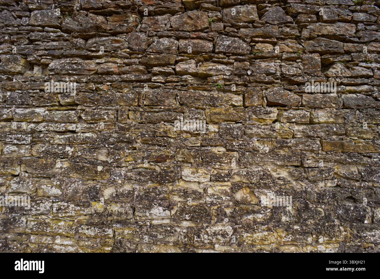 Hintergrund einer alten alten Schiefermauermauer Stockfoto