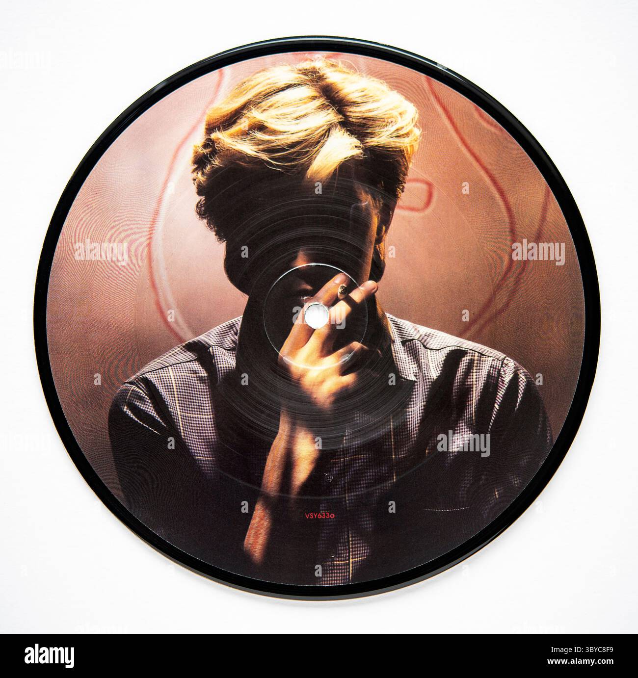 Seven Inch Picture Disc Version von Red Guitar, der Debütalbum von David Sylvian, die 1984 veröffentlicht wurde Stockfoto Seven Inch Picture Disc Version von Red Guitar, der Debütalbum von David Sylvian, die 1984 veröffentlicht wurde Stockfoto