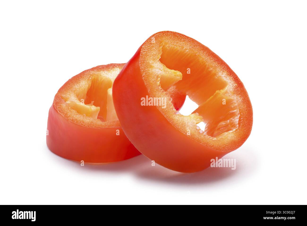 In Scheiben geschnitten orange ungarischen Heißwachs Pfeffer oder Paprika (Capsicum Annuum). Schneidepfade, Schatten getrennt Stockfoto