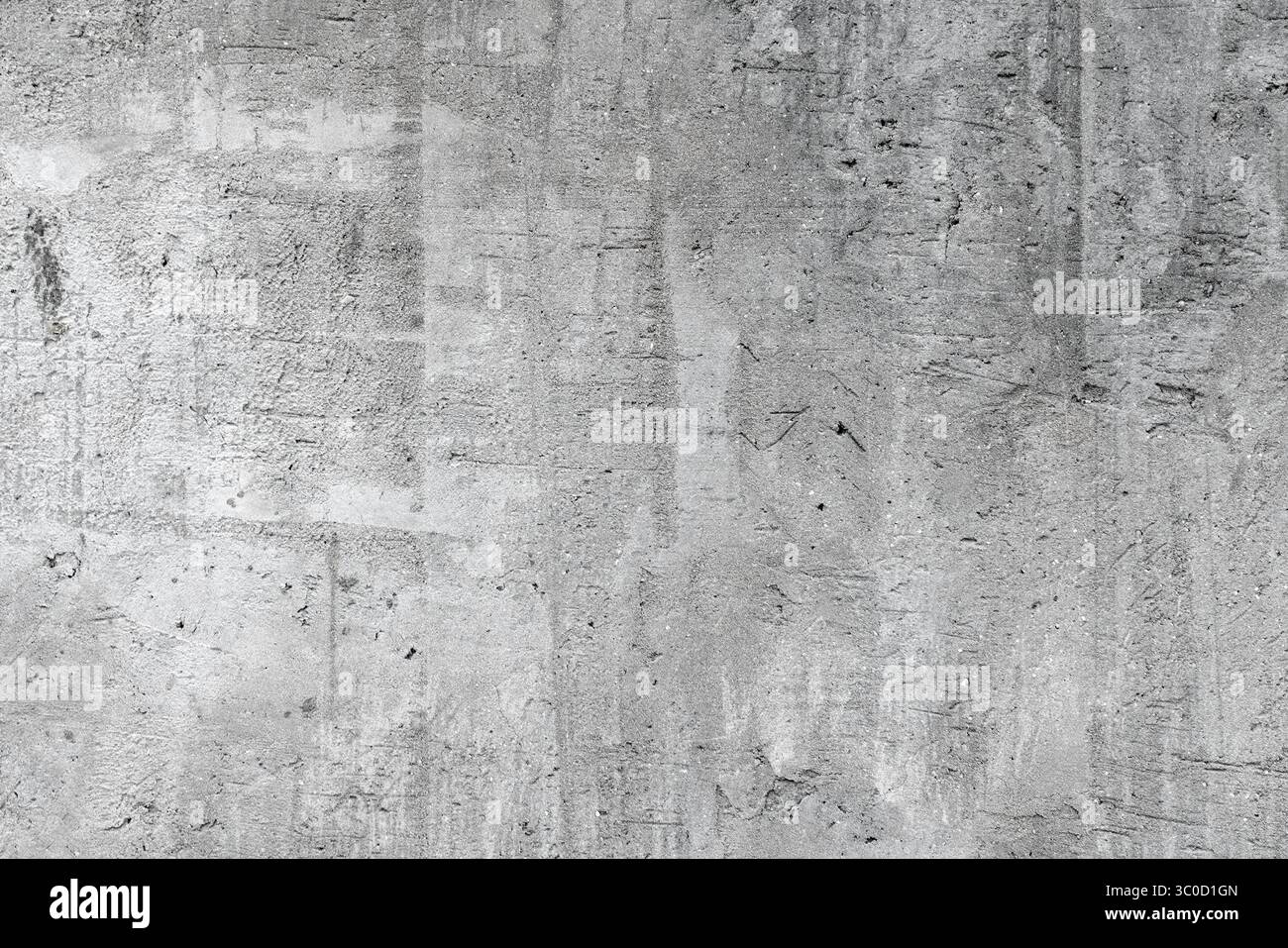 Betonoberfläche mit seiner robusten Textur und neutralen Grautönen, ideal für Hintergründe oder Bilder mit Baumotiven, die Rohmaterial und Intust betonen Stockfoto