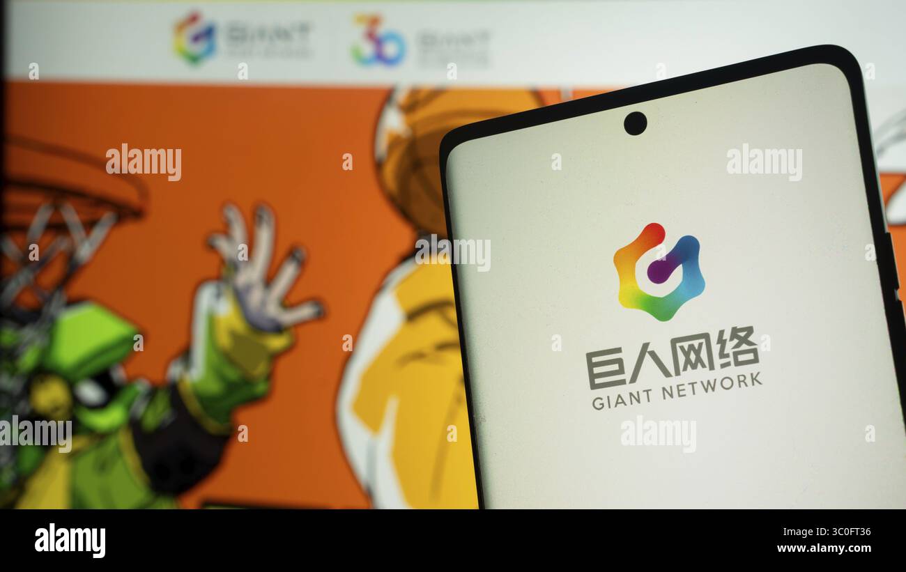 Ein Telefon mit dem Giant Network Logo und farbenfrohem Basketballmotiv Stockfoto