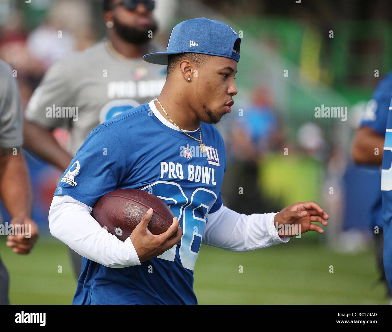 23. Januar 2019 – Orlando, FL, USA – NFC Running Back Saquon Barkley läuft während des NFL Pro Bowl Trainings bei ESPN Wide World of Sports am Mittwoch, 23. Januar 2019. (Foto: © Stephen M. Dowell/Orlando Sentinel/TNS via ZUMA Wire) Stockfoto