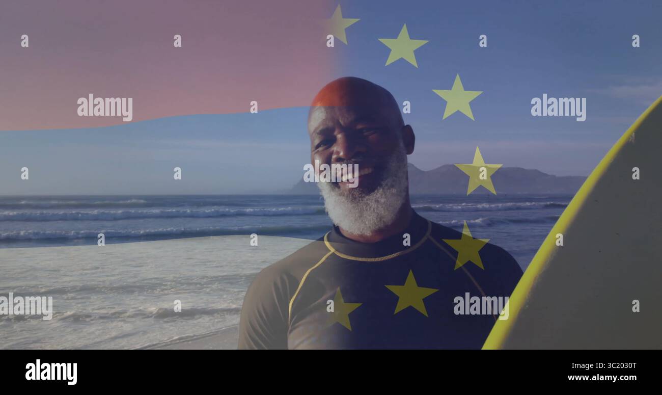 Stehender Mann im Taucheranzug mit gelbem Surfbrett am Ufer, mit EU-Sternen überlagert Stockfoto