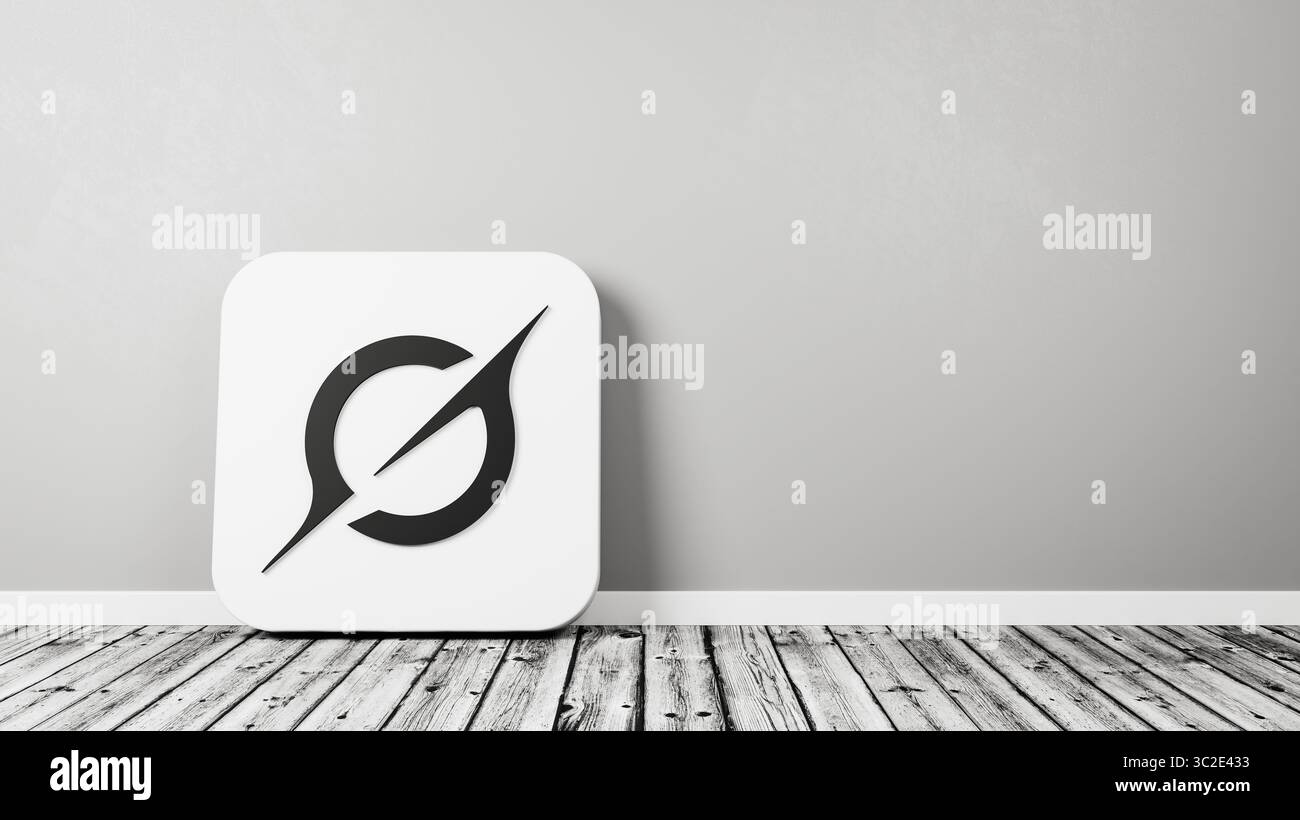 GROK App-Symbol auf Holzboden gegen Wand Stockfoto