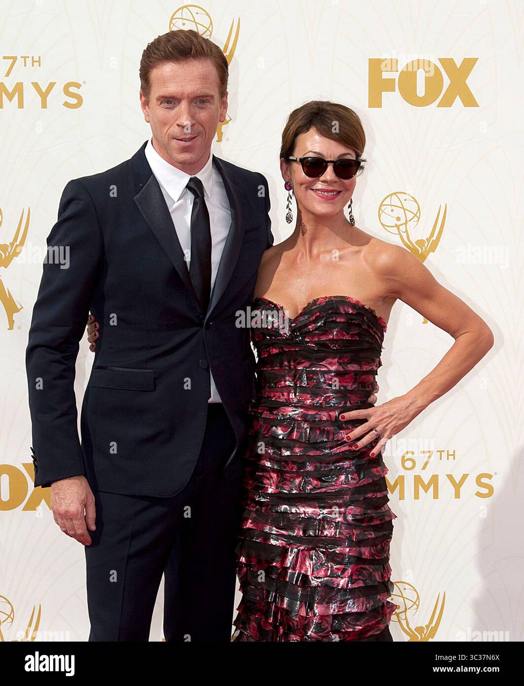 16. April 2021, Los Angeles, Kalifornien, USA: Schauspielerin Helen McCrory stirbt bei ihr zu Hause nach einem Kampf gegen Krebs. Sie war 52. DATEIFOTO: Damian Lewis und Helen McCrory auf dem roten Teppich der 67. Emmy Awards, die am Sonntag, den 20. September 2015 im Microsoft Theatre in Los Angeles, Kalifornien, stattfanden. JAVIER ROJAS/PI (Bild: © Prensa Internacional Via ZUMA Wire) Stockfoto