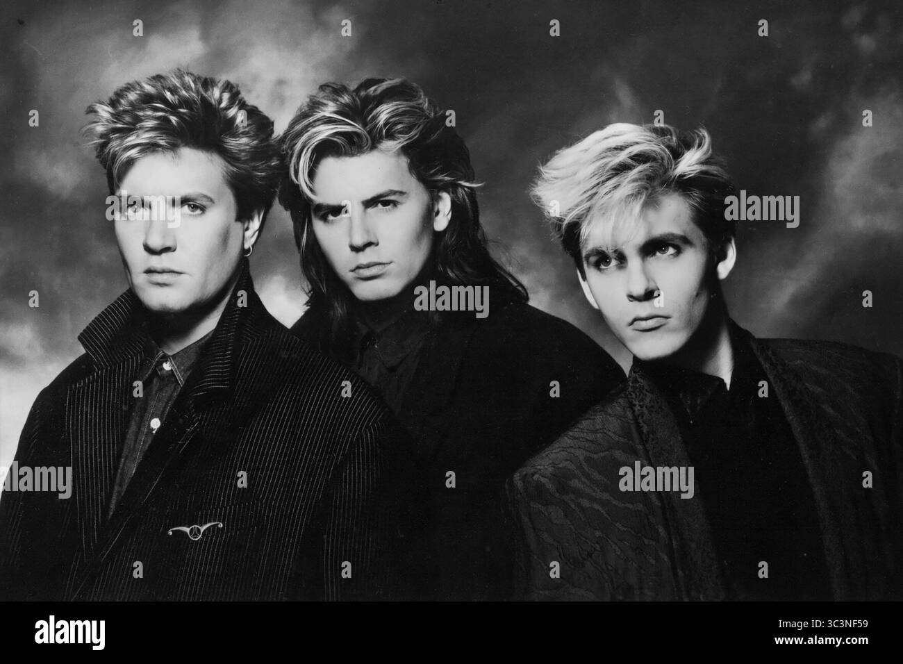 Duran Duran. Porträt der englischen Pop- und Rockband Duran Duran Duran als Trio, Werbefoto, 1986. Von links nach rechts: Simon LeBon, John Taylor und Nick Rhodes Stockfoto