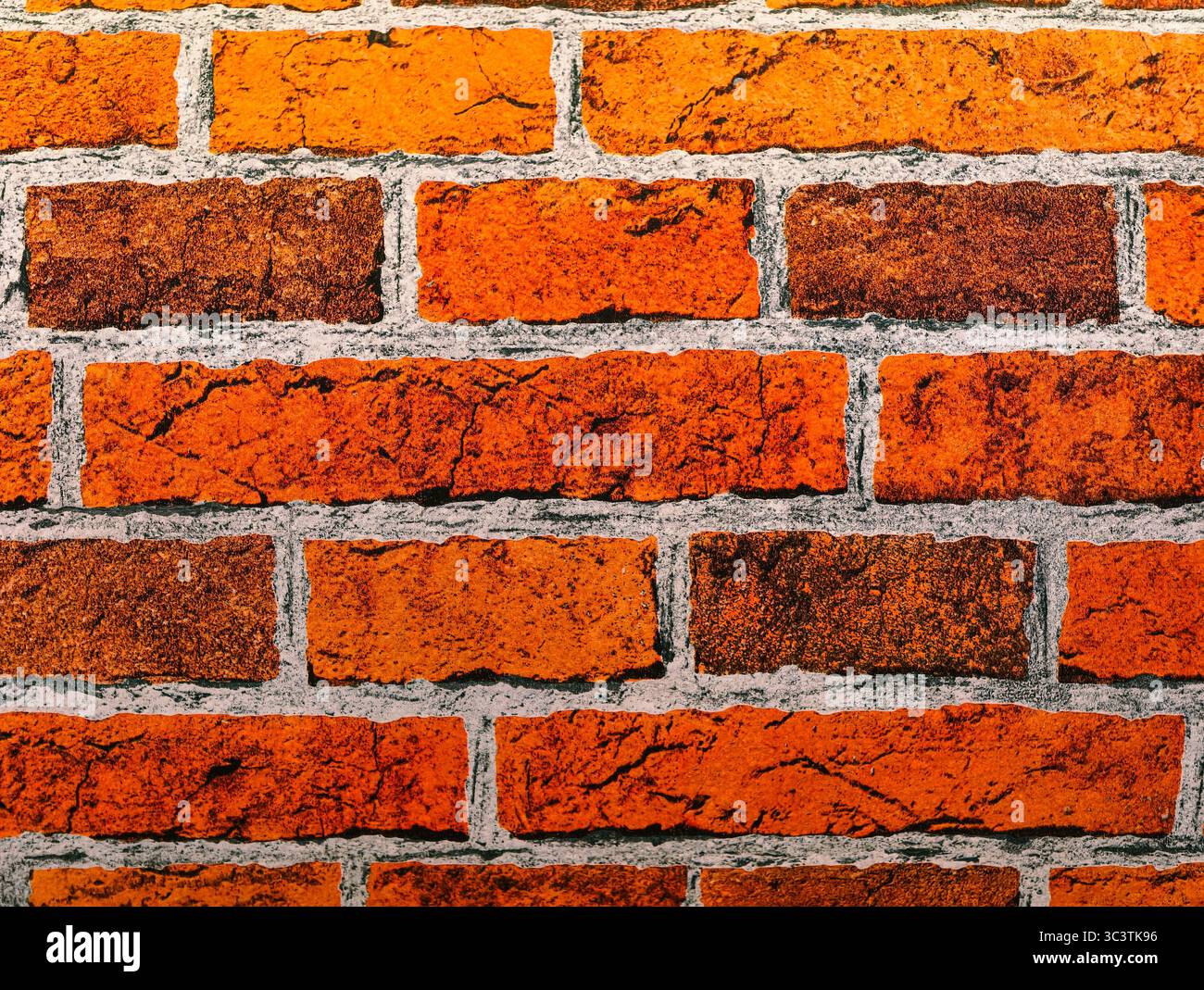 Lebendiger Hintergrund mit Backsteinwand für beeindruckende digitale Designs. Hochauflösendes Hintergrundbild und Bildschirmschoner für Telefone, Tablets, Laptops und Marketingmaterialien Stockfoto