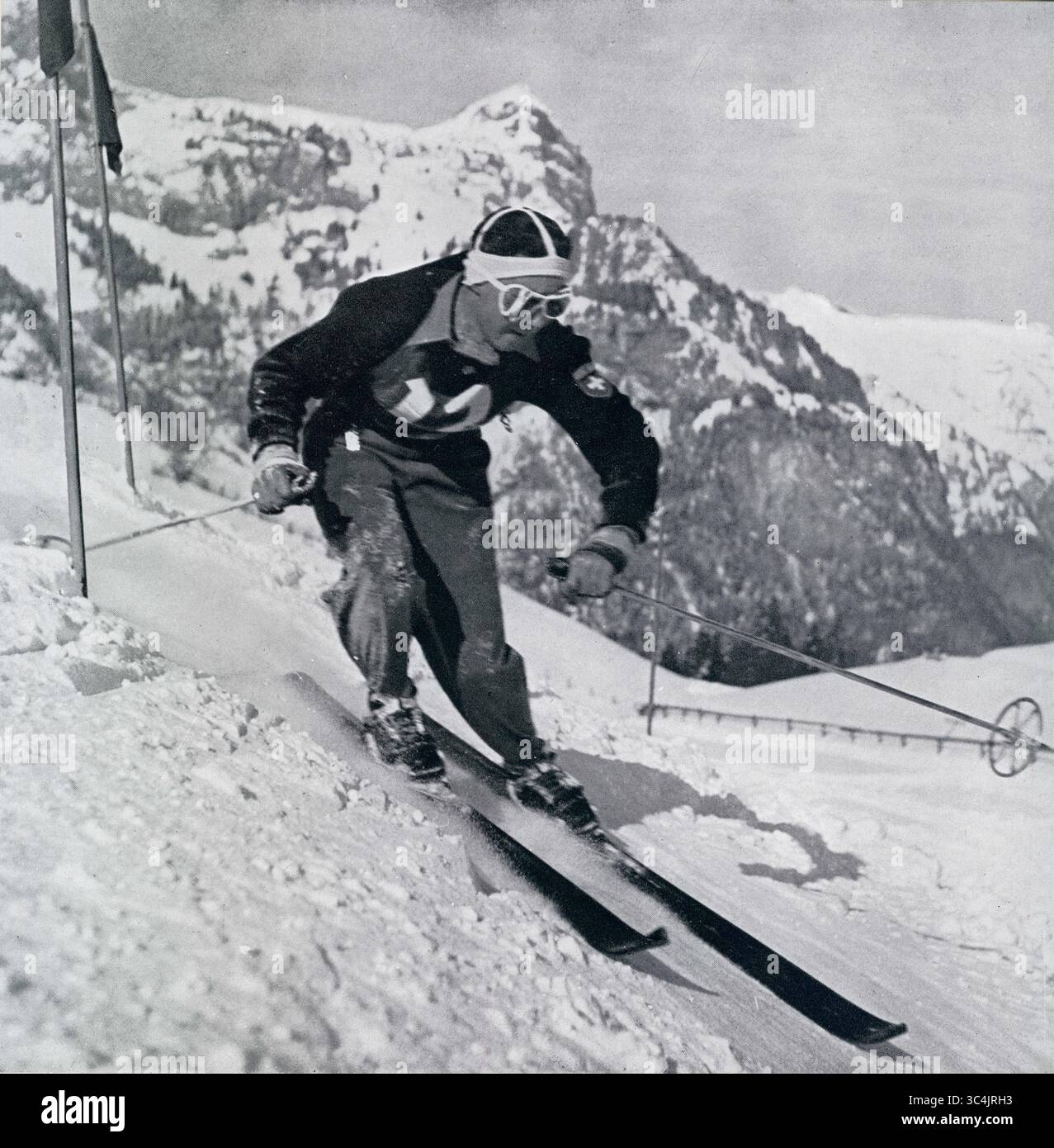 Vintage, Ende der 1940er Jahre, Schwarzweiß-Foto von Karl Molitor, in einem Slalomrennen Schweizer Champion, nahm an den Olympischen Winterspielen 1948 teil. Stockfoto
