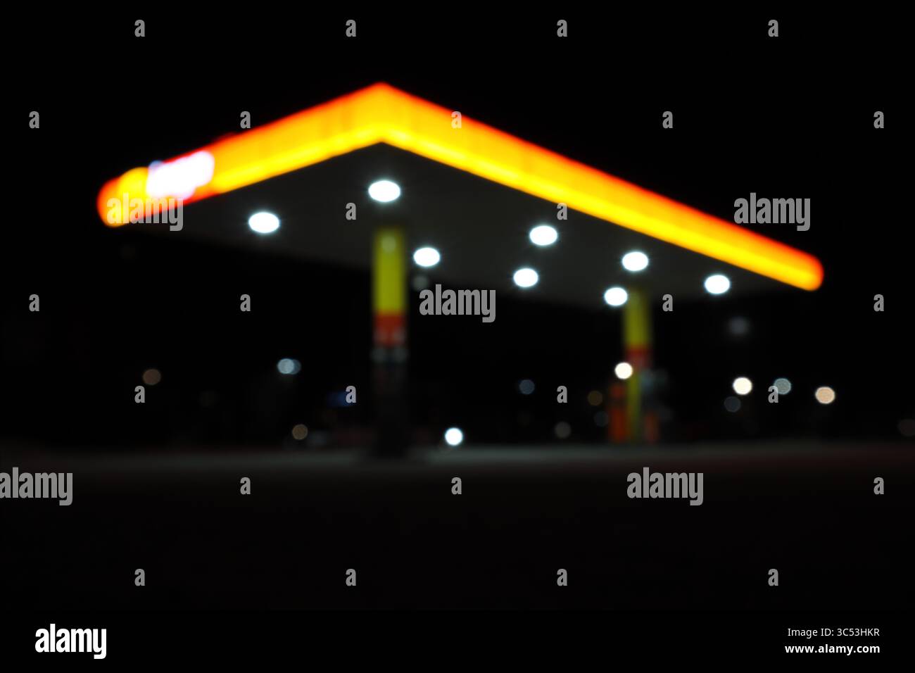 Bookeh Lichteffekt. Gelb und orange mit schwarzem Hintergrund. Stockfoto