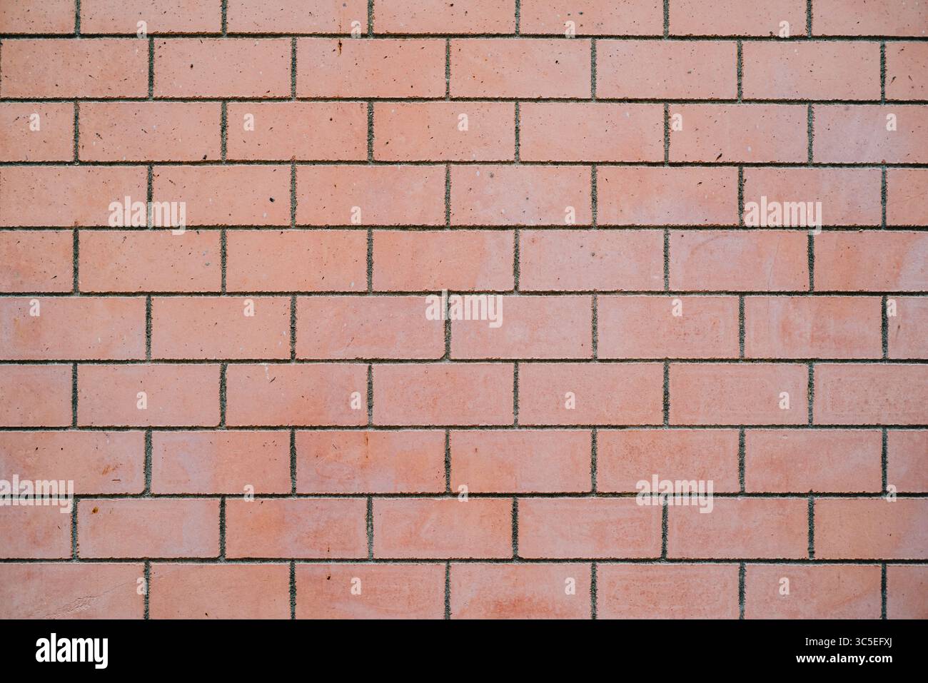 Nahaufnahme der verwitterten Ziegelwandstruktur Stockfoto