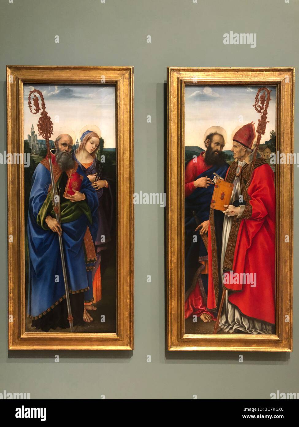 Ölgemälde aus dem 15. Jahrhundert: Die Heiligen Benedikt und Apollonia (links) und die Heiligen Paul und Frediano (rechts) von Filippino Lippi Stockfoto