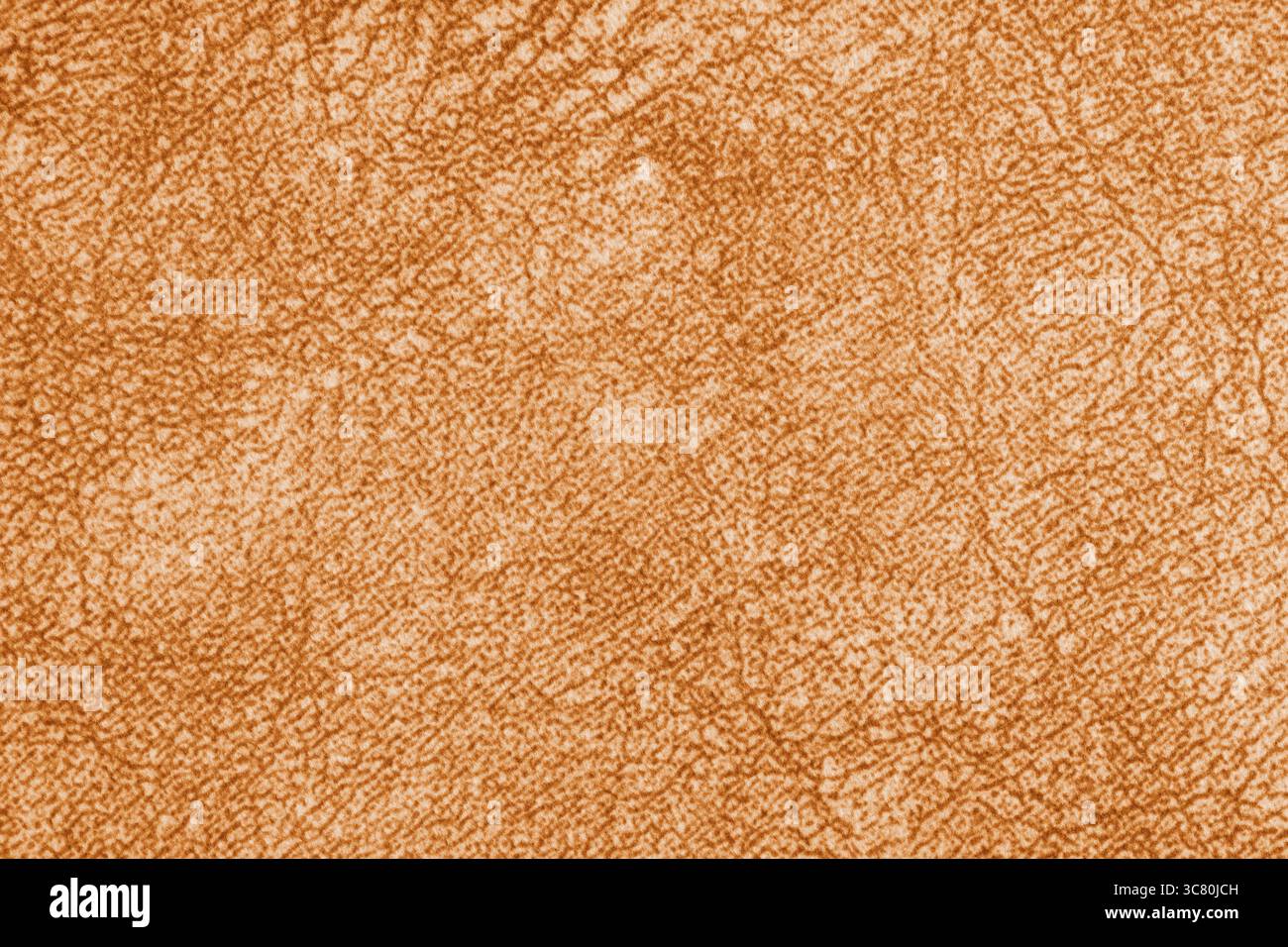 Nahaufnahme, Makro aus orangefarbener Textur mit feinen gewebten Fasern und weichem Textil, Stoffstruktur. Abstrakter unordentlicher Hintergrund, Textildesign, Polster Stockfoto