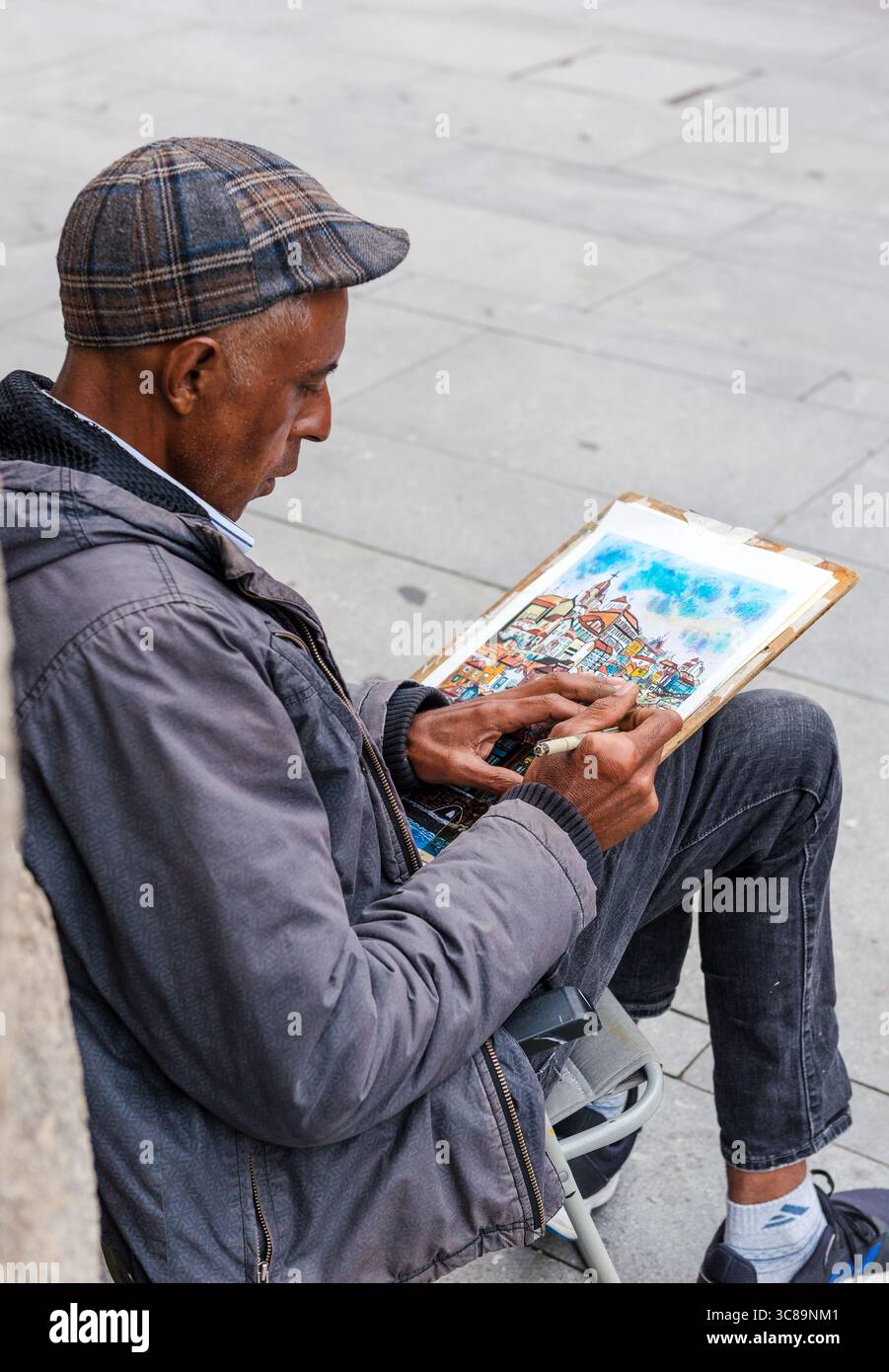 Straßenkünstler in der Altstadt von Porto, Portugal Stockfoto