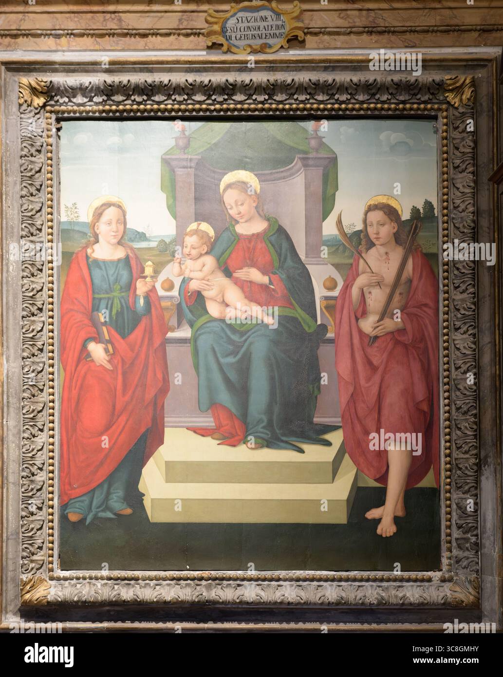 Jungfrau und Kind mit Heiligen, Renaissance-Altar in der Basilika San Pietro (Basilika di San Pietro), Perugia, Italien, zugeschrieben dem umbrischen Sch Stockfoto