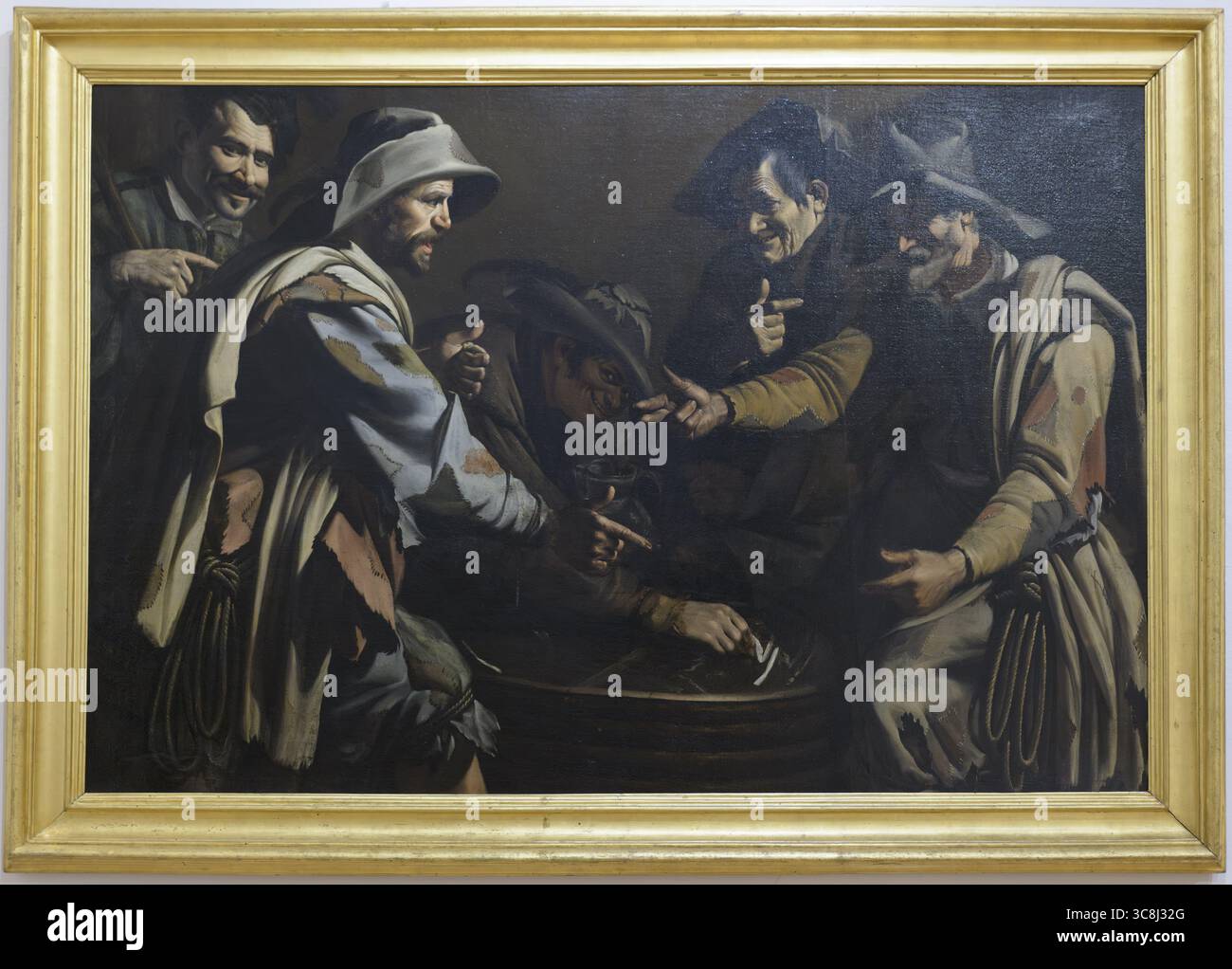 "Giocatori di Morra", anonymer Karavaggist-Maler, Öl auf Leinwand, Pinacoteca Nazionale di Siena, Siena, Italien. Stockfoto