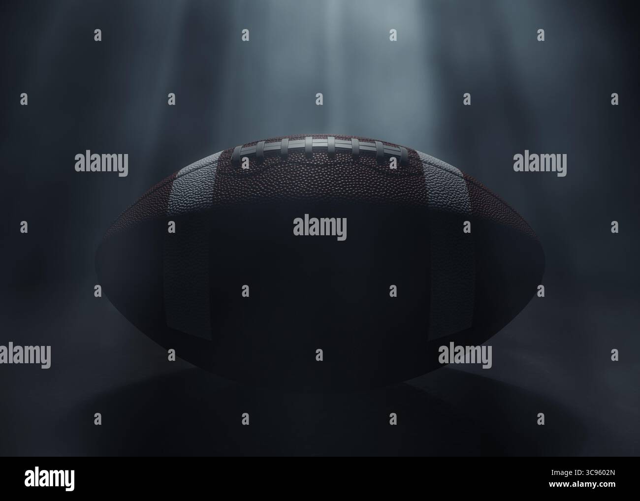 Ein american Football-Sportball, der von einem einzigen ätherischen Licht auf einem dunkelschwarzen Hintergrund beleuchtet wird – 3D-Rendering Stockfoto