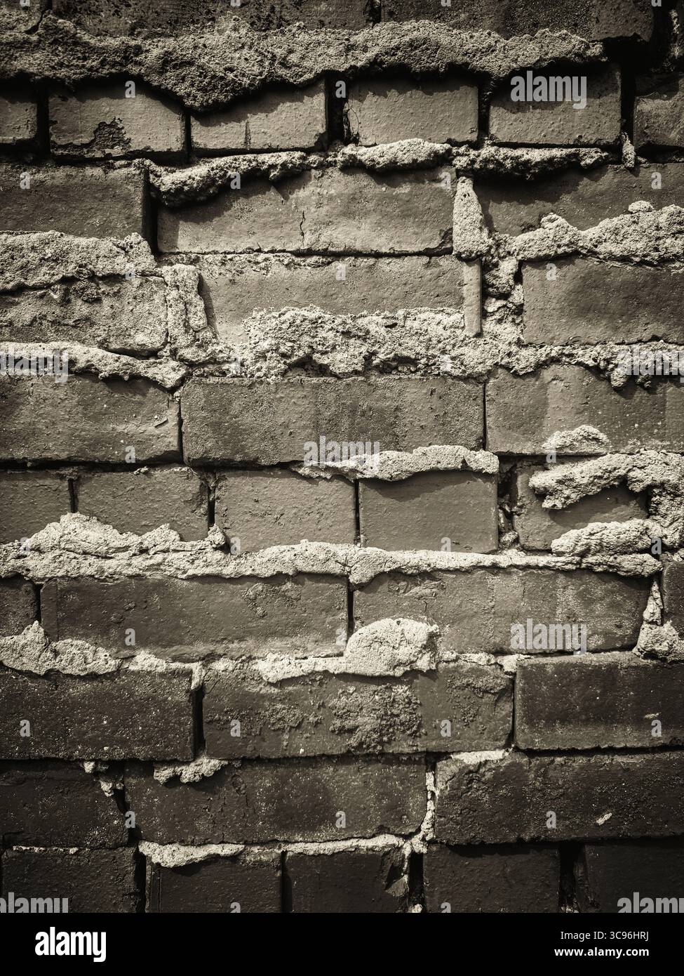 Detail einer Ziegelmauer in Sepia-Ton - Smartphone-aufgenommenes Stockfoto