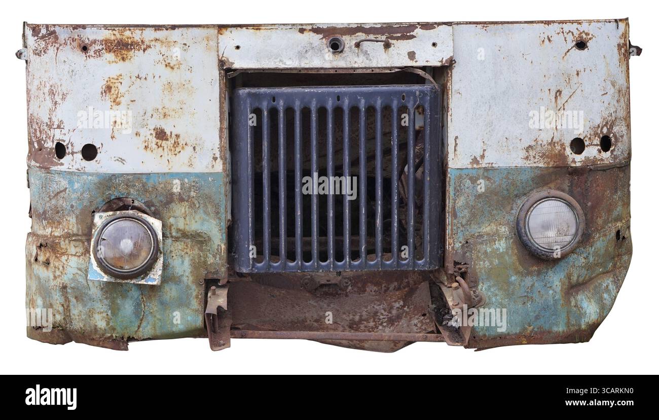 Kaputte Glasscheinwerfer ein Radiato auf dem rostigen Eisen eines blauen Vinatge-Busses Stockfoto