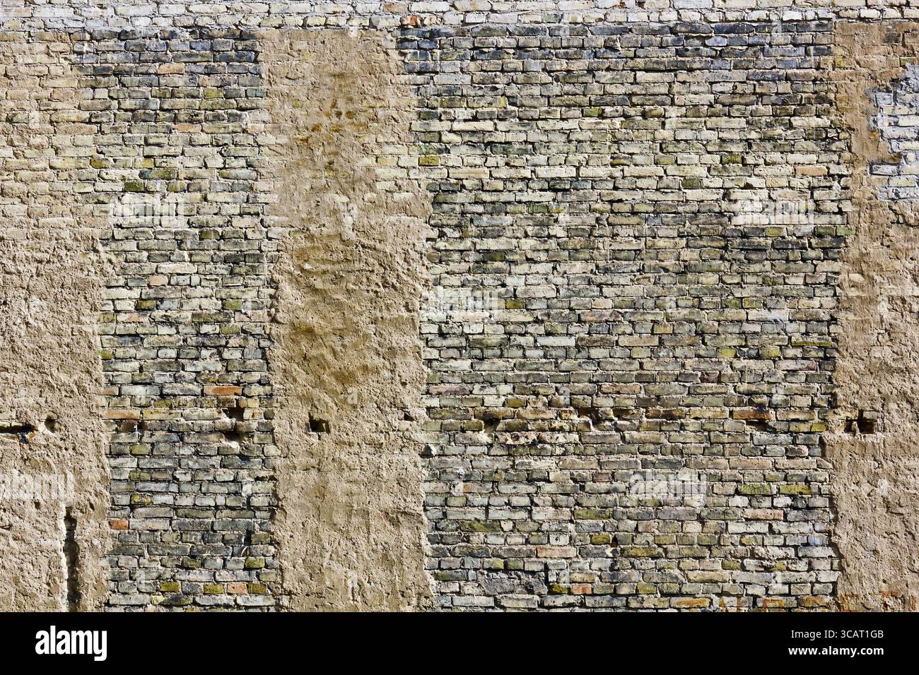 Großer Stein gelb retro Wand Hintergrund Textur - tausend Ziegel auf ein Bildkonzept Stockfoto