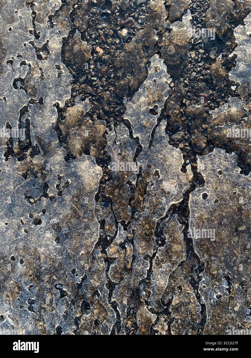 Eis und Stein gefrorene Textur Stockfoto