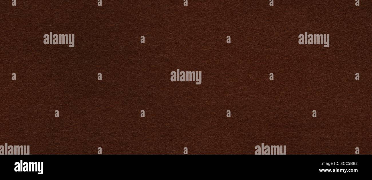 Eine einladende Textur aus tiefem, nahtlosem Filz, die Wärme und organische Eleganz in ihrer Einfachheit erzeugt Stockfoto