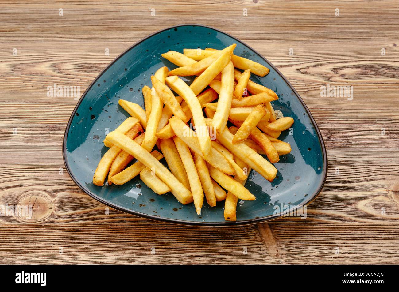 Pommes auf einem Teller Stockfoto