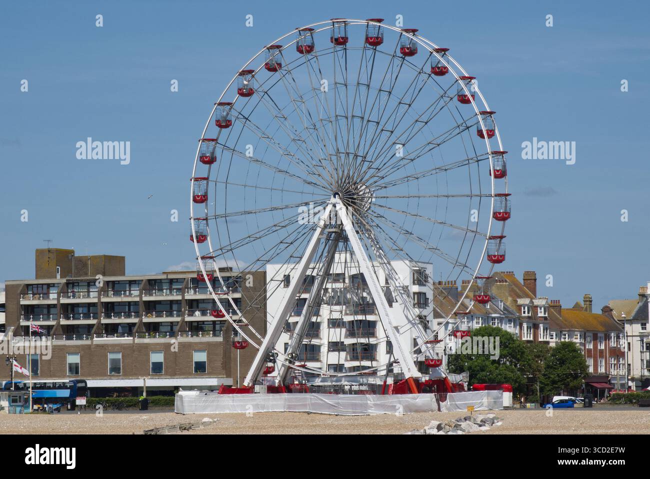 Fahrt mit dem Big Wheel auf der Strandpromenade von Worthing in West Sussex, England Stockfoto