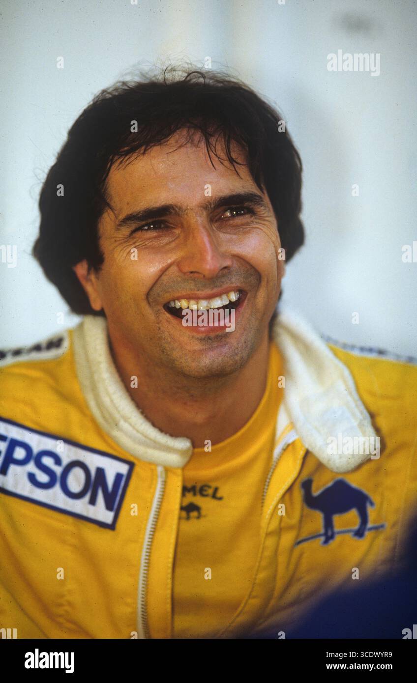 Nelson Piquet 1989 Portrait Face Happy Lächeln Kopf und Schultern aus der Nähe. Der brasilianische Formel-1-Fahrer und dreifache Weltmeister (1981, 1983, 1987) fuhr von 1978 bis 1991 mit Brabham, Williams, Lotus und Benetton und erzielte 23 Grand-Prix-Siege. Aus Brasilien fährt das Camel Team Lotus Honda Stockfoto