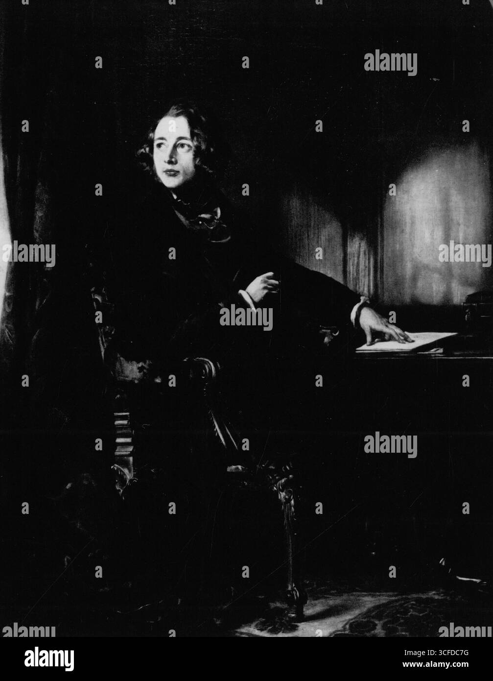 Charles Dickens ( 1812 - 1870 ) als junger Mann an seinem Schreibtisch undatiert Stockfoto