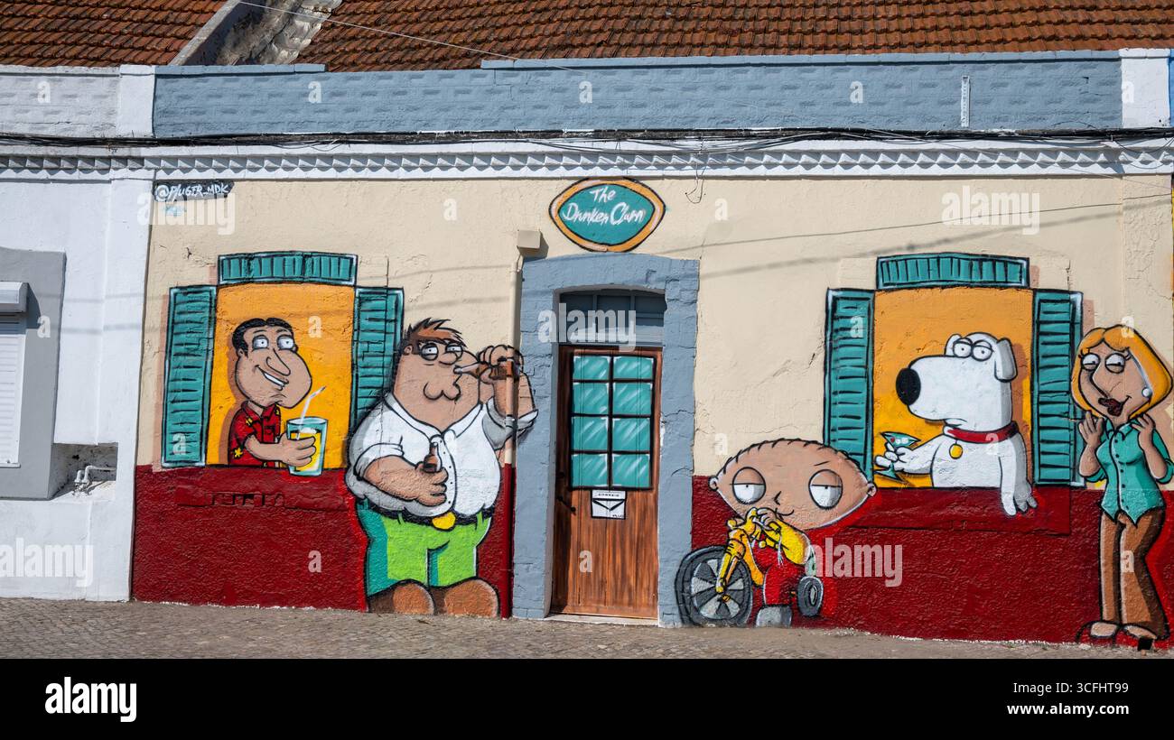 Das Fototapete für Familienmitglieder verleiht den Straßen von Amora Humor und Farbe Stockfoto