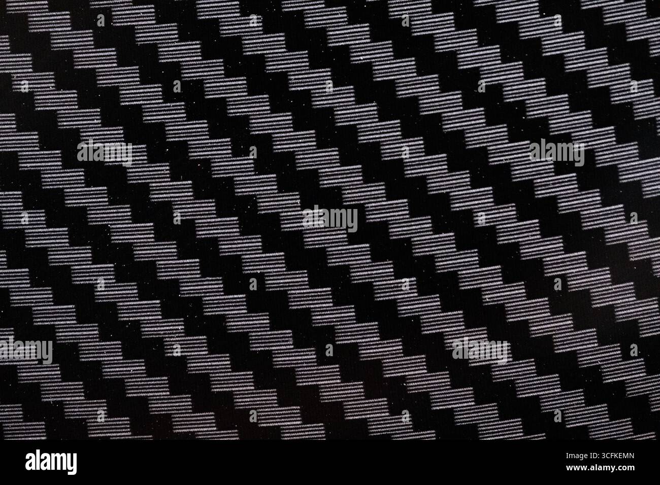 Schwarzer Kohlefaserhintergrund mit Kopierraum für Text oder Bild Stockfoto