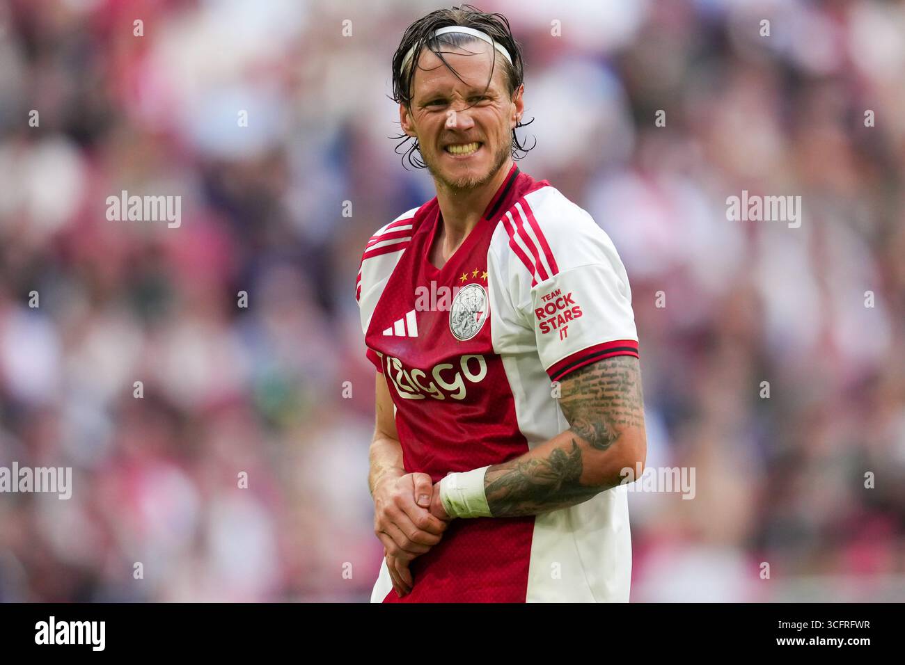 AMSTERDAM, NIEDERLANDE - 24. AUGUST: Wout Weghorst von AFC Ajax reagiert während des niederländischen Eredivisie-Spiels zwischen AFC Ajax und Heracles Almelo in der Johan Cruijff Arena am 24. August 2025 in Amsterdam. (Foto: Patrick Goosen/Orange Pictures) Stockfoto