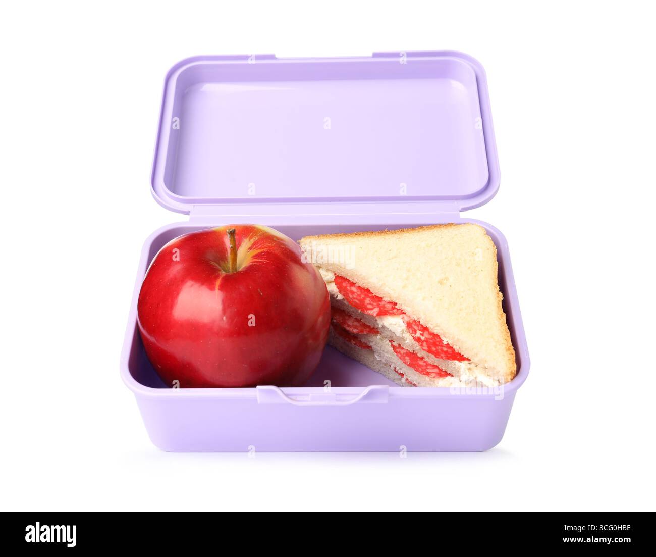 Offene Lunchbox mit leckerem Sandwich und Apfel isoliert auf weiß Stockfoto