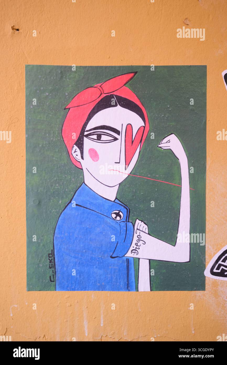 Eine Parodie auf den klassischen Zweiten Weltkrieg, Rosie the Riveter, We Can Do IT Illustration. Mit Herz, Liebesauge. Street Art, Graffiti in Bologna, Italien. Stockfoto