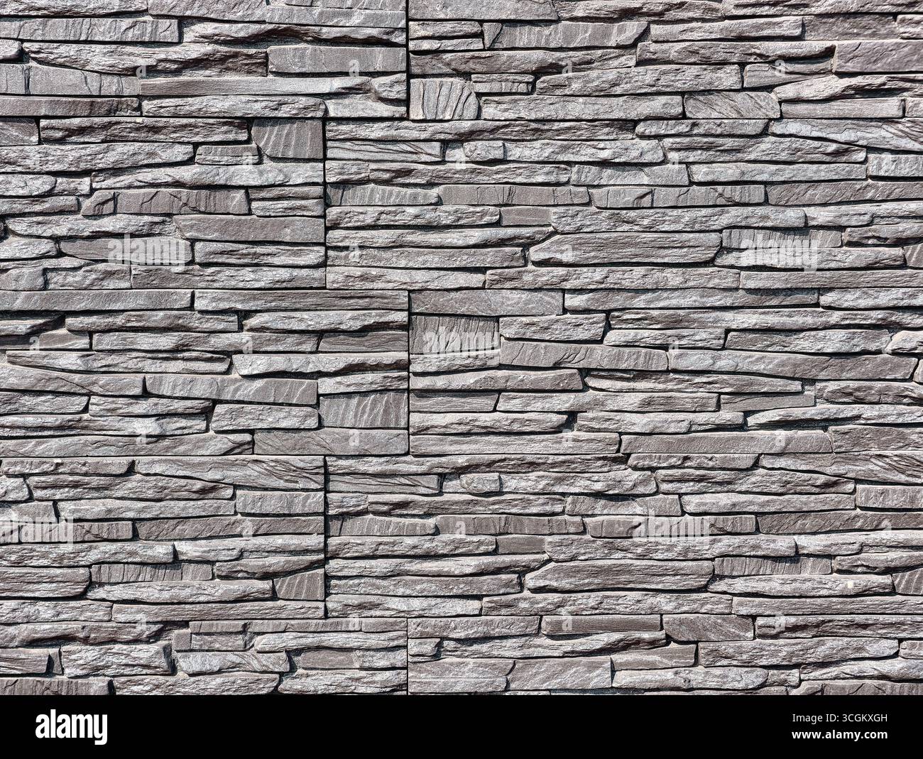 Steinwand-Textur – hochauflösender grauer Steinhintergrund für digitale Hintergründe, Fotografie-Hintergründe, Webdesign, minimalistische Kreationen und ansprechende Marketingmaterialien in allen Branchen Stockfoto