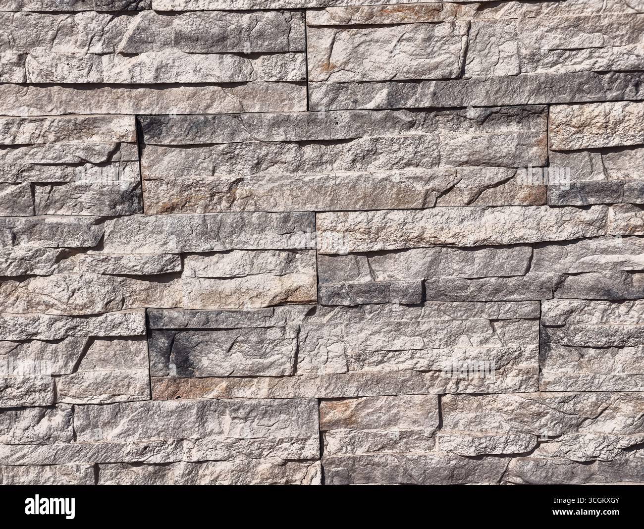 Steinmauer Textur: Hochauflösender rustikaler Hintergrund für Architektur, digitale Hintergründe, Fotografie, Webdesign, Marketingmaterialien, Wohnkultur und kreative Werbeaktionen in allen Branchen Stockfoto
