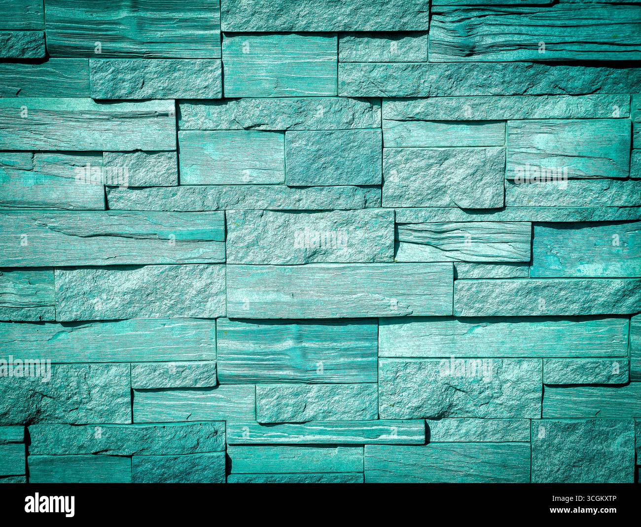 Türkisfarbene strukturierte Steinwand Hintergrund: Lebendiges und modernes Design ideal für digitale Hintergründe, minimalistische türkisfarbene Hintergrundbilder, kreative Werbeaktionen, Fotografie, Webdesign und kommerzielle Anwendungen Stockfoto