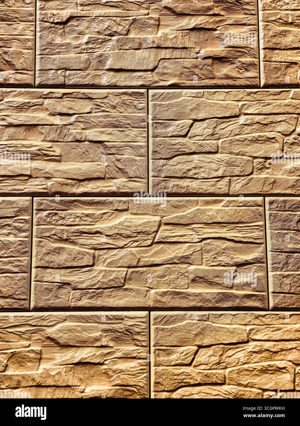 High-Resolution Golden Stone Wall Texture Hintergrund für Fotografie, Architektur, Webdesign, minimalistisches Dekor und kreatives Marketing Werbeaktionen – perfekt für digitale Hintergründe und ansprechende Visuals Stockfoto