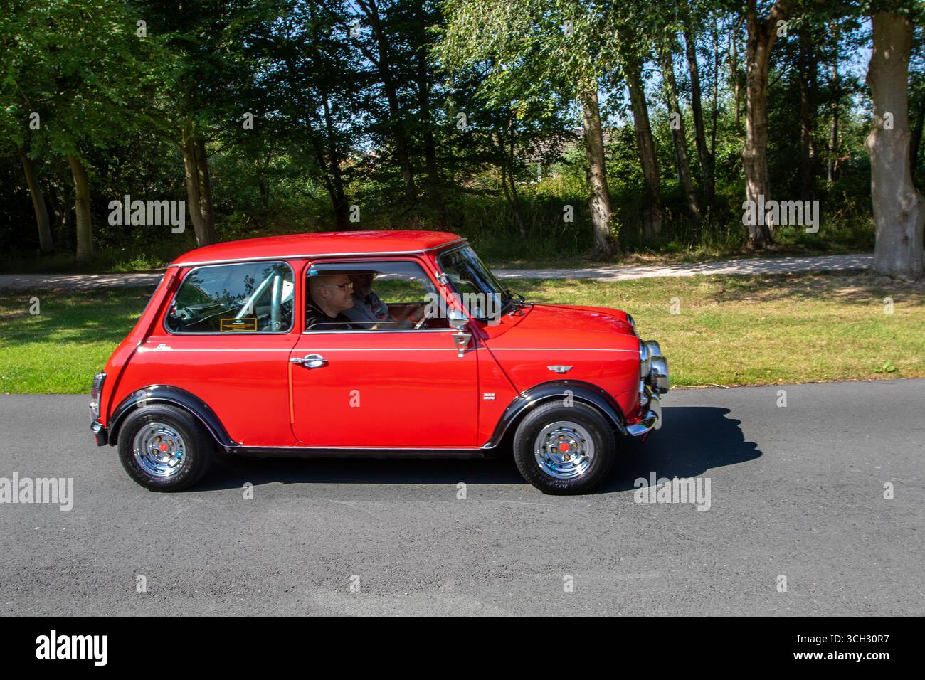 1989 Flame Red Austin Mini 1000 City E, 4-Gang-Rechtslenkung; auf der Lytham Hall Mega MINI Classic und Performance, Sammler und Enthusiasten Motorshow. UK Stockfoto