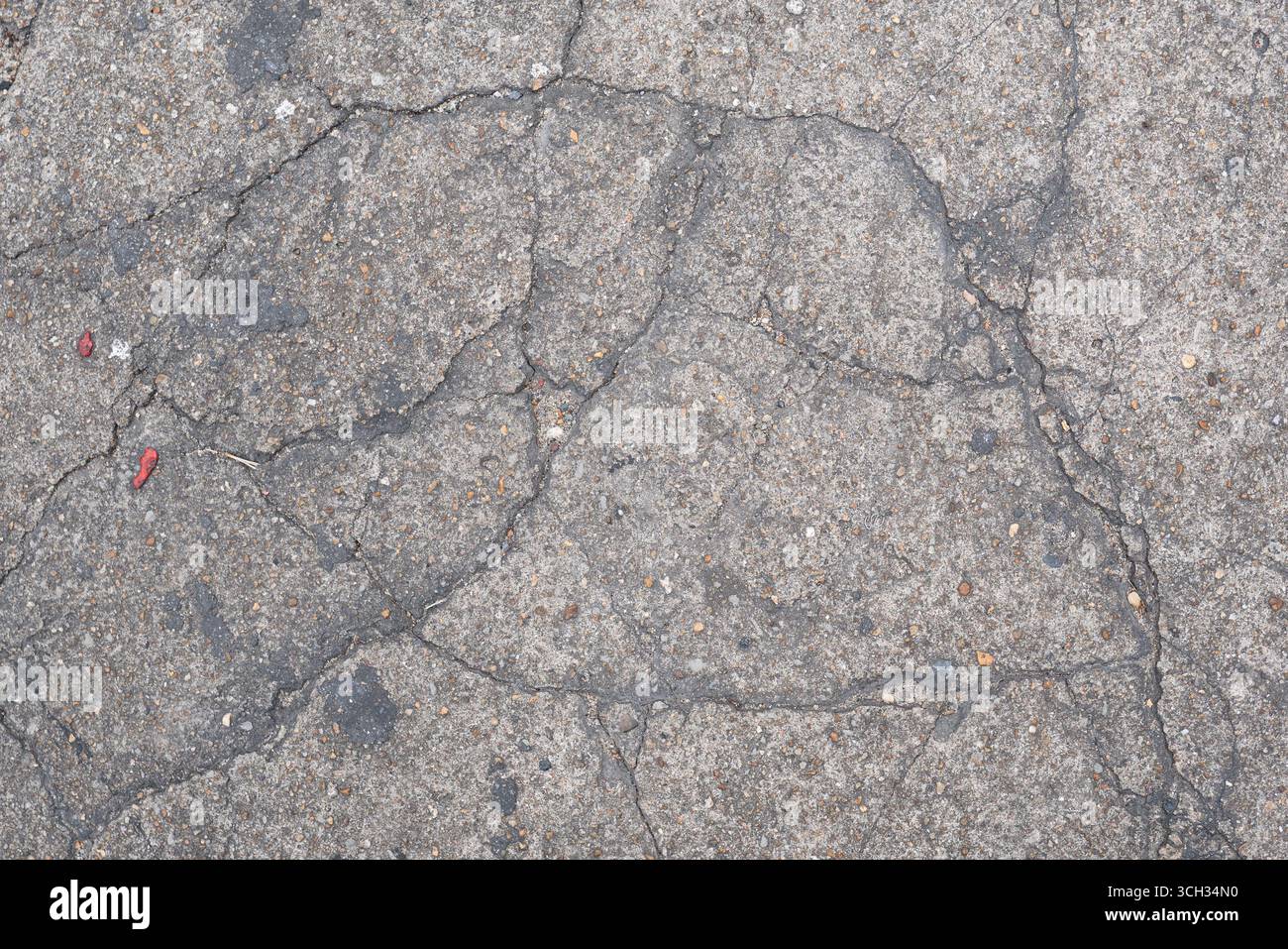 Alte rissige graue Betonbodenstruktur Hintergrund Stockfoto