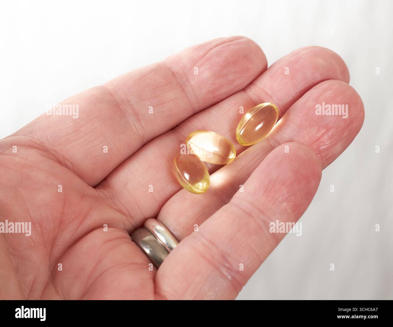 Vitamin E ist ein Nahrungsergänzungsmittel, Vitamin E ist auch ein starkes Antioxidans, das die Gesundheit des Herzens unterstützt, das Immunsystem unterstützt, die Gesundheit der Haut unterstützt!! Stockfoto